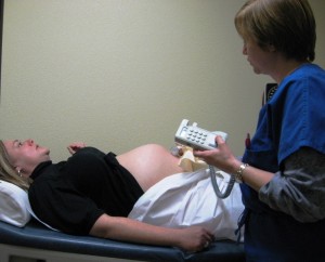Kathy impressionating a dead person ....gets checked out by our great doctor:  Dr. Omar