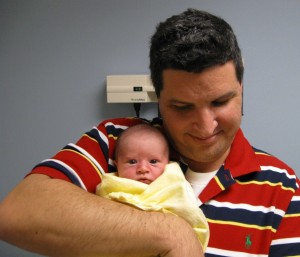 copy-of-090311gracefirstdoctorappt-22 In the check-up room: Dad and Grace wait a few minutes for the doctor