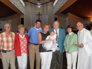Group photo with the baptism girl and Father Norm