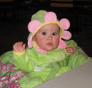 Grace during lunch date with mom and dad